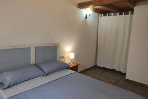 Posteľ alebo postele v izbe v ubytovaní Casa Escola