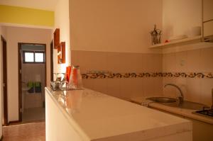 Kuchyň nebo kuchyňský kout v ubytování Misturod - Holiday Apartments + 25 fotografií