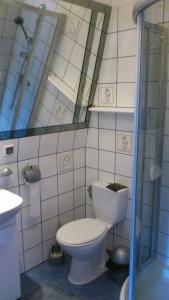 Phòng tắm tại Pensjonat Perła