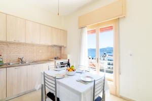 Kuchyň nebo kuchyňský kout v ubytování Aloe Apartments