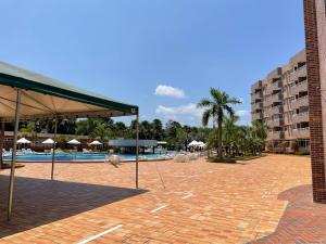 Swimmingpoolen hos eller tæt på Barreirinhas Lençóis Flat Residence