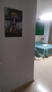 Postel nebo postele na pokoji v ubytování Casa Klos - Quartos amplos