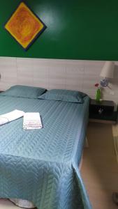 Postel nebo postele na pokoji v ubytování Casa Klos - Quartos amplos