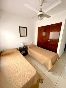 Postel nebo postele na pokoji v ubytování Hotel Davinci