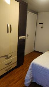 Postel nebo postele na pokoji v ubytování Casa Klos - Quartos amplos
