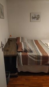 Postel nebo postele na pokoji v ubytování Casa Klos - Quartos amplos