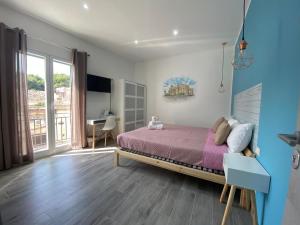 TV a/nebo společenská místnost v ubytování La Piccola Formica Charme Rooms