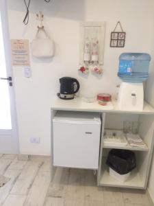 a kitchen with a counter with a coffee maker on it at Finca La Celestita in Colonia Alvear