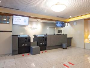 an office with a waiting room with a check in counter at Hotel Cuore Nagasaki Ekimae in Nagasaki +24 photos