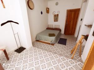 Postel nebo postele na pokoji v ubytování Dhara House Malta