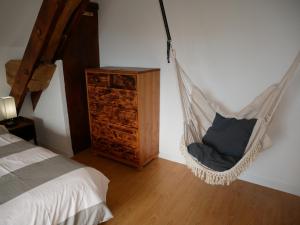 Gîte du Lavoir - gitesdesbalcons-com 객실 침대