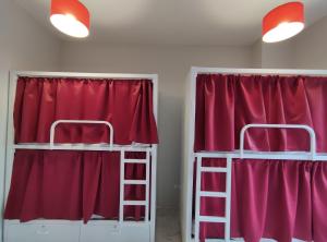 Posteľ alebo postele v izbe v ubytovaní New Samay Hostel