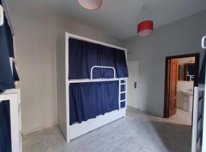 Krevet ili kreveti na sprat u jedinici u okviru objekta New Samay Hostel