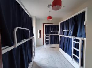 Posteľ alebo postele v izbe v ubytovaní New Samay Hostel