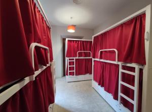 Posteľ alebo postele v izbe v ubytovaní New Samay Hostel