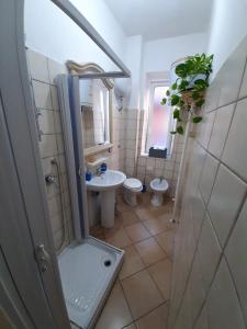Koupelna v ubytování Room&Relax