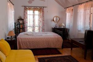 Posteľ alebo postele v izbe v ubytovaní Elise Cottage