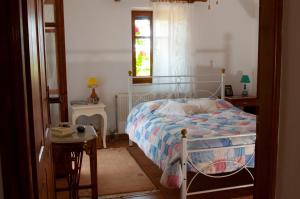 Posteľ alebo postele v izbe v ubytovaní Elise Cottage