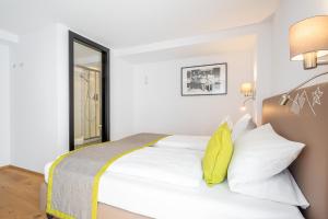 Letto o letti in una camera di Edelweiss Apartments 200m zum Lift - Silvretta Card Premium Inklusive