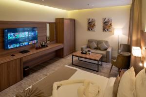 TV a/nebo společenská místnost v ubytování W Suites Hotel
