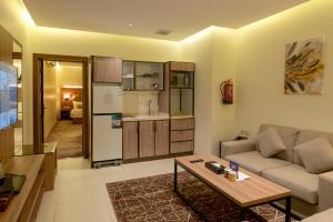Kuchyň nebo kuchyňský kout v ubytování W Suites Hotel