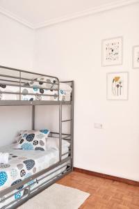 Postel nebo postele na pokoji v ubytování Apartamento El Coso