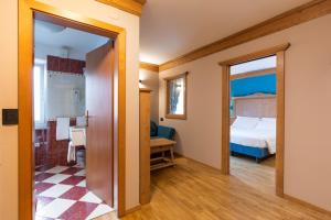 Posteľ alebo postele v izbe v ubytovaní Hotel Medil