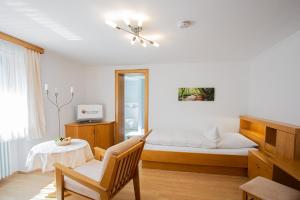 Postel nebo postele na pokoji v ubytování Gästehaus Prinzregent Luitpold