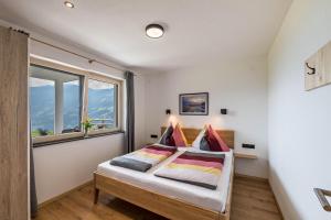 Posteľ alebo postele v izbe v ubytovaní Ferienwohnung am Mühlbachl