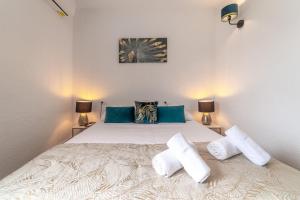 Ένα ή περισσότερα κρεβάτια σε δωμάτιο στο Myflats Villa los Pinos