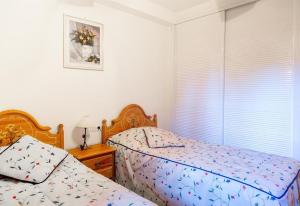 Posteľ alebo postele v izbe v ubytovaní Apartment Mijas Costa - La Joya