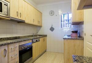Kuchyňa alebo kuchynka v ubytovaní Apartment Mijas Costa - La Joya