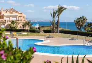 Bazén v ubytovaní Apartment Mijas Costa - La Joya alebo v jeho blízkosti