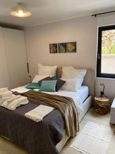 Postel nebo postele na pokoji v ubytování Villa Castanea