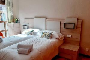Posteľ alebo postele v izbe v ubytovaní Adosado Marblés con Txoko y Wifi