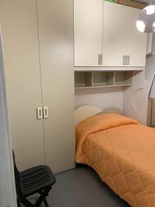 Ένα ή περισσότερα κρεβάτια σε δωμάτιο στο Villa Agamennone