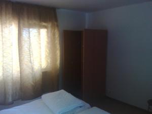 Ένα ή περισσότερα κρεβάτια σε δωμάτιο στο Casa Noastra +7 φωτογραφίες