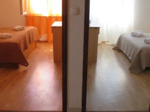 Postel nebo postele na pokoji v ubytování Holiday home Marija i Lucija