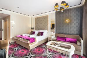 Łóżko lub łóżka w pokoju w obiekcie Hotel Royal Baltic 4* Luxury Boutique