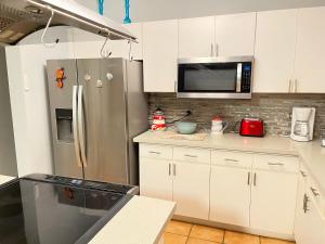 Dapur atau dapur kecil di Condo Beach Court