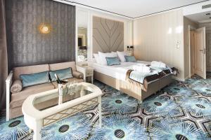 Łóżko lub łóżka w pokoju w obiekcie Hotel Royal Baltic 4* Luxury Boutique