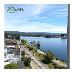 arial view of a city and a body of water at Vista al río Calle - Calle in Valdivia