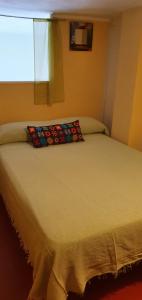 Postel nebo postele na pokoji v ubytování Casa Rural EL PUENTE