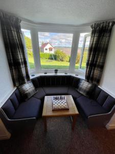 Χώρος καθιστικού στο Garth- Stunning Scenic semi-rural Cottage with Games room