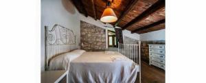 Postel nebo postele na pokoji v ubytování B&B Etico La Casa di Toti