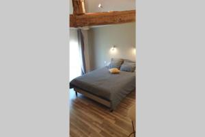 Postel nebo postele na pokoji v ubytování Maison de charme au coeur du Sud Ouest