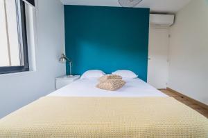 Ένα ή περισσότερα κρεβάτια σε δωμάτιο στο GUIERLE #4 - Appartement lumineux - 1 Chambre