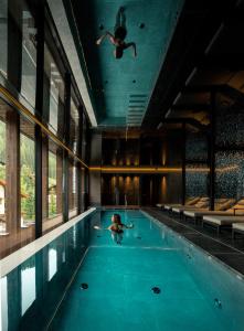 Bazén v ubytovaní Linder Cycling Hotel alebo v jeho blízkosti
