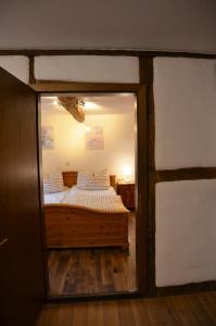 Postel nebo postele na pokoji v ubytování Altes Winzerhaus - Ferienhaus