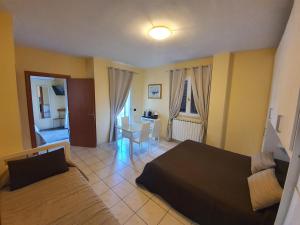 Postel nebo postele na pokoji v ubytování Guest House Brezza Marina